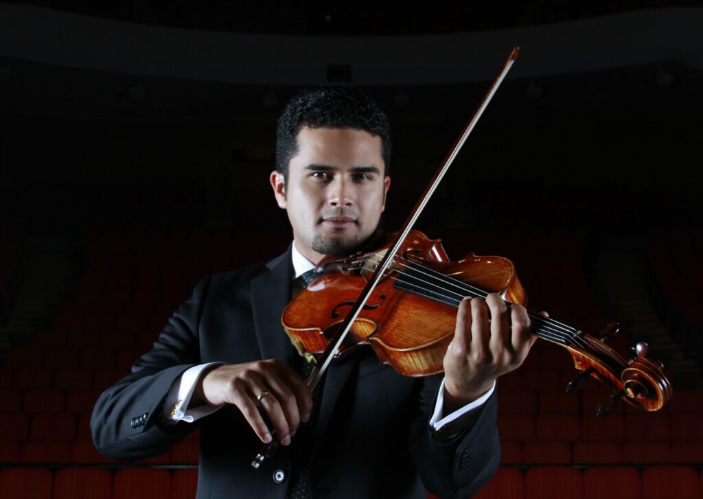 David Pedraza Playing a Violin Headshot